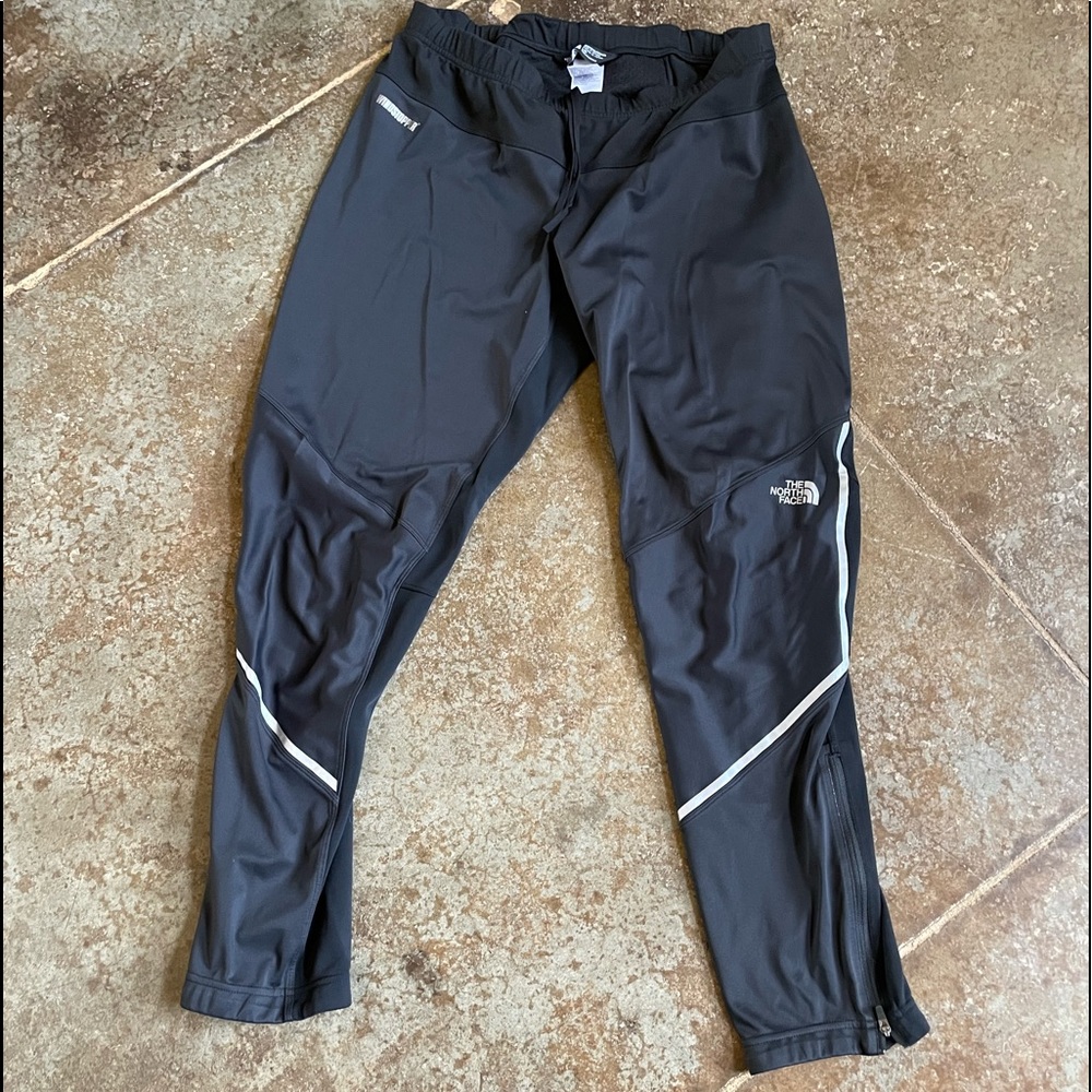 North face large windstopper reflective lined running pants w/ankle zippers. New